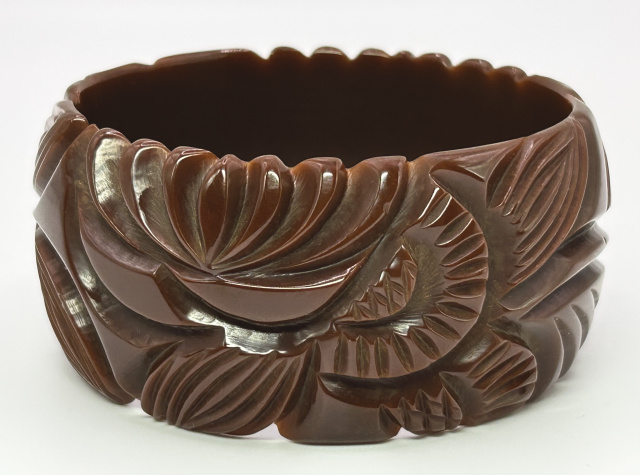 BB517 wide lotus, leaf and circular carved light brown bakelite bangle